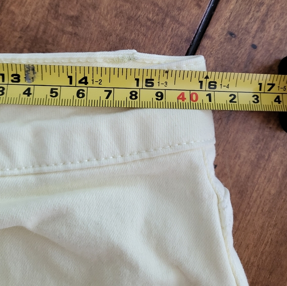 Mid-rise Yellow Distressed Shorts - Picture 7 of 10